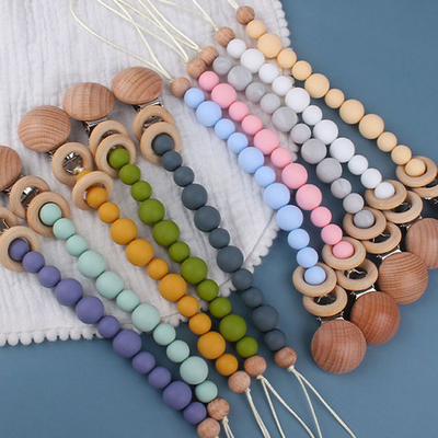 ที่ใส่จุกซิลิโคนที่เป็นมิตรกับสิ่งแวดล้อมสำหรับเด็กวัยหัดเดิน Beaded Pacifier Clip Heat Resistant