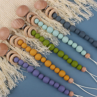 ที่ใส่จุกซิลิโคนที่เป็นมิตรกับสิ่งแวดล้อมสำหรับเด็กวัยหัดเดิน Beaded Pacifier Clip Heat Resistant