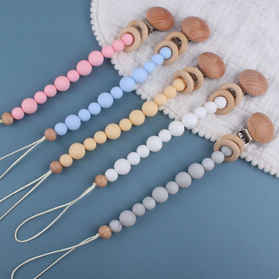 ที่ใส่จุกซิลิโคนที่เป็นมิตรกับสิ่งแวดล้อมสำหรับเด็กวัยหัดเดิน Beaded Pacifier Clip Heat Resistant