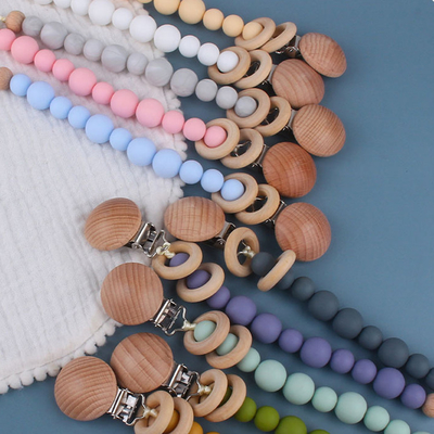 ที่ใส่จุกซิลิโคนที่เป็นมิตรกับสิ่งแวดล้อมสำหรับเด็กวัยหัดเดิน Beaded Pacifier Clip Heat Resistant